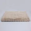 A beige orthopedic dog bed is shown from a side angle against a white background. Náhľad obrázku produktu