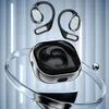 A pair of black wireless earbuds with a charging case, presented in a futuristic, abstract setting with glowing blue lights and metallic rings. Produktbild-Vorschau