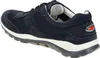 A dark blue sneaker is shown from a side-rear angle against a white background. Voir les images du produit