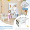 Children playing with an art easel and desk set. Produktbild-Vorschau