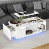 A modern white coffee table with a lifting top is placed in front of a sectional sofa.