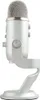 A silver microphone on a stand against a white background. Produktbild-Vorschau