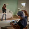 Two children are playing with a DJ set in a bedroom. Produktbild-Vorschau