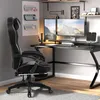 A gaming setup with a chair, desk, and monitors. Náhľad obrázku produktu