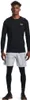 A man wearing athletic clothing stands facing the camera against a white background. Voir les images du produit