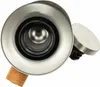 Close-up view of a sink drain with a stopper. Voir les images du produit