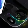 A close-up of a multi-device wireless charging station with a digital clock and LED lighting. Produktbild-Vorschau