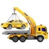 A yellow toy tow truck with a yellow toy taxi being lifted by its crane, against a white background. Anteprima dell’immagine prodotto