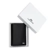 A black Lacoste wallet is presented in its white branded box, with the lid open and angled. Anteprima dell’immagine prodotto