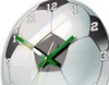A close-up of a clock designed to look like a soccer ball. Produktbild-Vorschau
