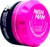 A close-up of a pink and black hair sculpting paste container. Produktbild-Vorschau