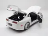 A white toy model of a Toyota Supra with its doors, hood, and trunk open, displayed on a white background. Anteprima dell’immagine prodotto