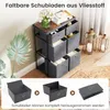 A storage unit with fabric drawers, displayed in a room setting with decorative elements. Anteprima dell’immagine prodotto