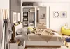 A bedroom scene with a bed, closet, and armchair. Produktbild-Vorschau
