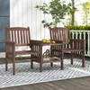 A wooden garden bench set with a small table on a porch. Produktbild-Vorschau