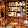 A miniature library scene with bookshelves, a chair, and a table. Voir les images du produit