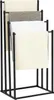 A black metal towel rack with four arms, holding several folded towels of different colors and patterns. Produktbild-Vorschau