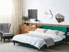 A bedroom scene with a bed, chair, and dresser. Náhľad obrázku produktu