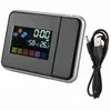 A digital alarm clock with weather display and a USB cable on a white background. Náhled obrázku produktu