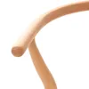 A close-up view of a curved wooden element, likely part of a chair. Podgląd zdjęcia produktu
