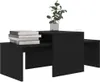 A set of black nesting coffee tables with books stacked on one and a plant on the other. Anteprima dell’immagine prodotto