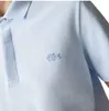 Lacoste Polo krótki rękaw jasnoniebieski bawełna 2 guziki Podgląd zdjęcia produktu 13