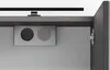 Interior view of a cabinet with a light fixture and two circular openings. Produktbild-Vorschau