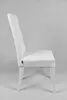 Side view of a white dining chair. Voir les images du produit