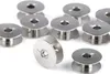 A group of silver sewing machine bobbins on a white background. Produktbild-Vorschau