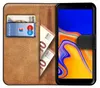 A book-style phone case with a Samsung Galaxy J6 Plus phone inside, along with a bank card and euro banknotes. Anteprima dell’immagine prodotto
