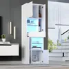 A modern white display cabinet with LED lighting, showcasing various items on its shelves, set against a gray wall and a window with blinds. Anteprima dell’immagine prodotto
