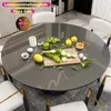 A round dining table with food items on it, viewed from a slightly elevated angle. Anteprima dell’immagine prodotto