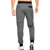 The back view of a person wearing grey jogger pants. Produktbild-Vorschau
