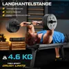 A man is lying on a weight bench and lifting a barbell. Produktbild-Vorschau