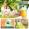 A family having a picnic in a park, with close-ups of a portable blender. Produktbild-Vorschau
