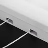 A close-up view of two white cords emerging from two rectangular openings in a white housing. Náhľad obrázku produktu