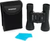 A pair of black Celestron binoculars and its carrying case are displayed on a white background, along with two blue cleaning cloths. Náhľad obrázku produktu