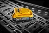 A yellow DeWalt Powerstack 18V battery sits on a textured metal surface. Anteprima dell’immagine prodotto