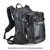 A black backpack with an attached drypack, shown from a side-diagonal angle against a white background. Produktbild-Vorschau