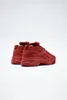 A pair of red Reebok Cardi B Club C V2 sneakers shown from the back. Voir les images du produit