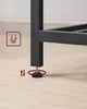 Close-up of the adjustable foot of a black metal furniture leg on a light wooden floor. Náhled obrázku produktu
