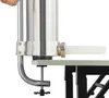 A close-up of a manual sausage stuffer attached to a table with a clamp. Náhled obrázku produktu