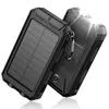 Two black solar power banks are shown against a white background. One is angled towards the viewer, showing its solar panel and charging indicator lights. The other is angled away, with its LED flashlight illuminated. Produktbild-Vorschau