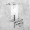 A silver outdoor wall lamp with a glass cylinder and a white bulb, mounted on a textured gray wall. Produktbild-Vorschau