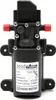 A black water pump with red fittings and a label. Podgląd zdjęcia produktu