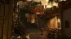 A street scene in a village with laundry hanging overhead. Produktbild-Vorschau