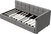 A grey upholstered bed frame with a slatted base is shown from a diagonal top-down view. Náhľad obrázku produktu
