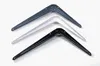 Three L-shaped shelf brackets in different colors (gray, silver, black) are arranged diagonally on a white background. Produktbild-Vorschau