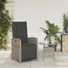 An outdoor patio scene with a chair and small table. Produktbild-Vorschau