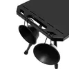 A close-up view of a black outdoor folding table with two black cups hanging from hooks. Produktbild-Vorschau